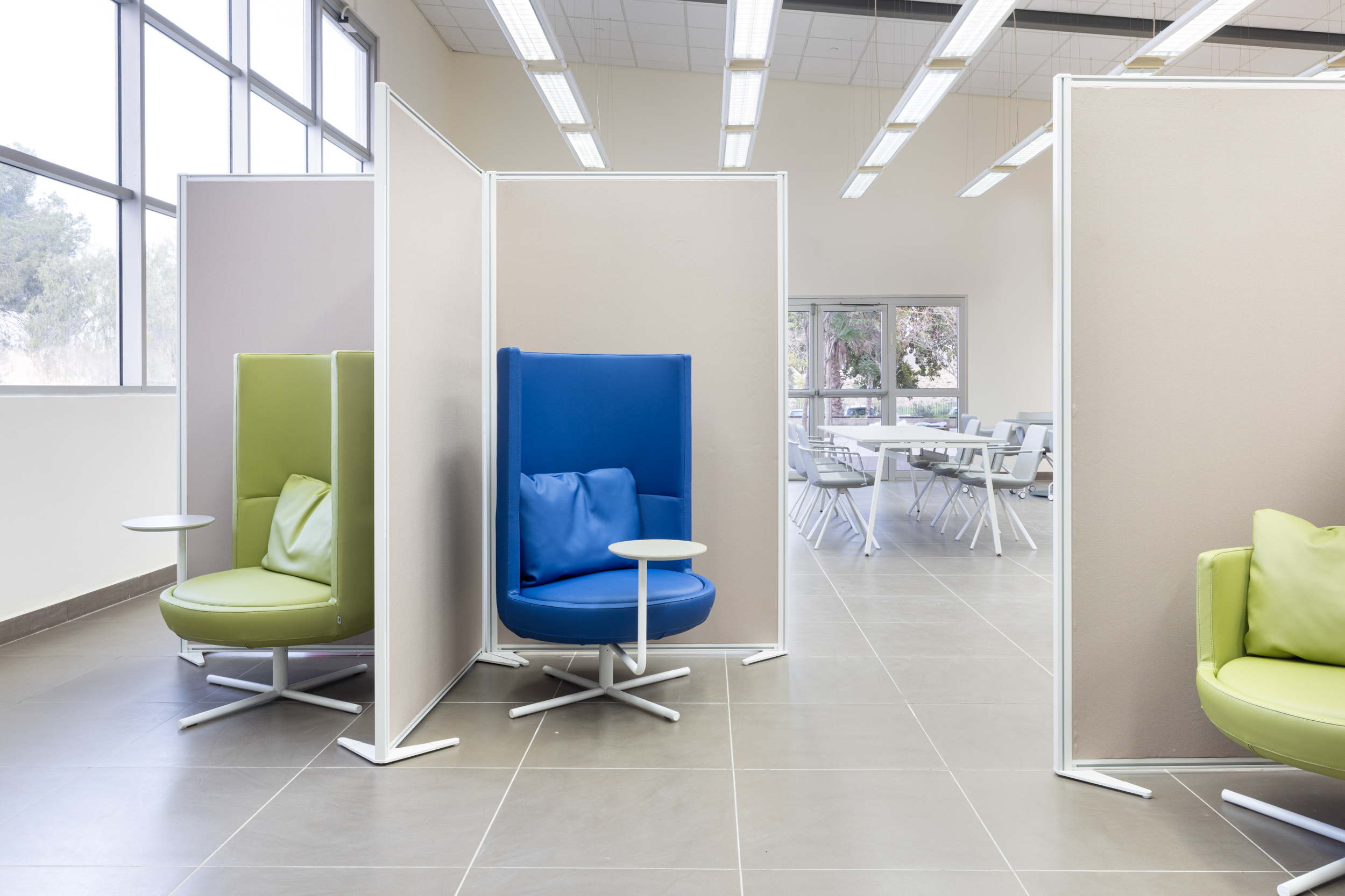 Split partition by Actiu+round armchair+pera chair by B&T